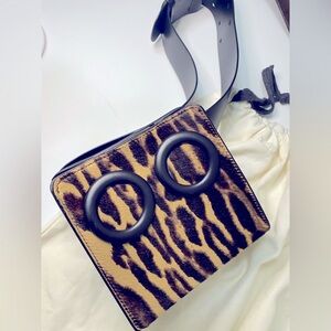 ❤️❤️BOYY belt bag in furry skin and black leather.